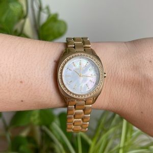 DKNY Gold Watch with Opalescent Pearl Face